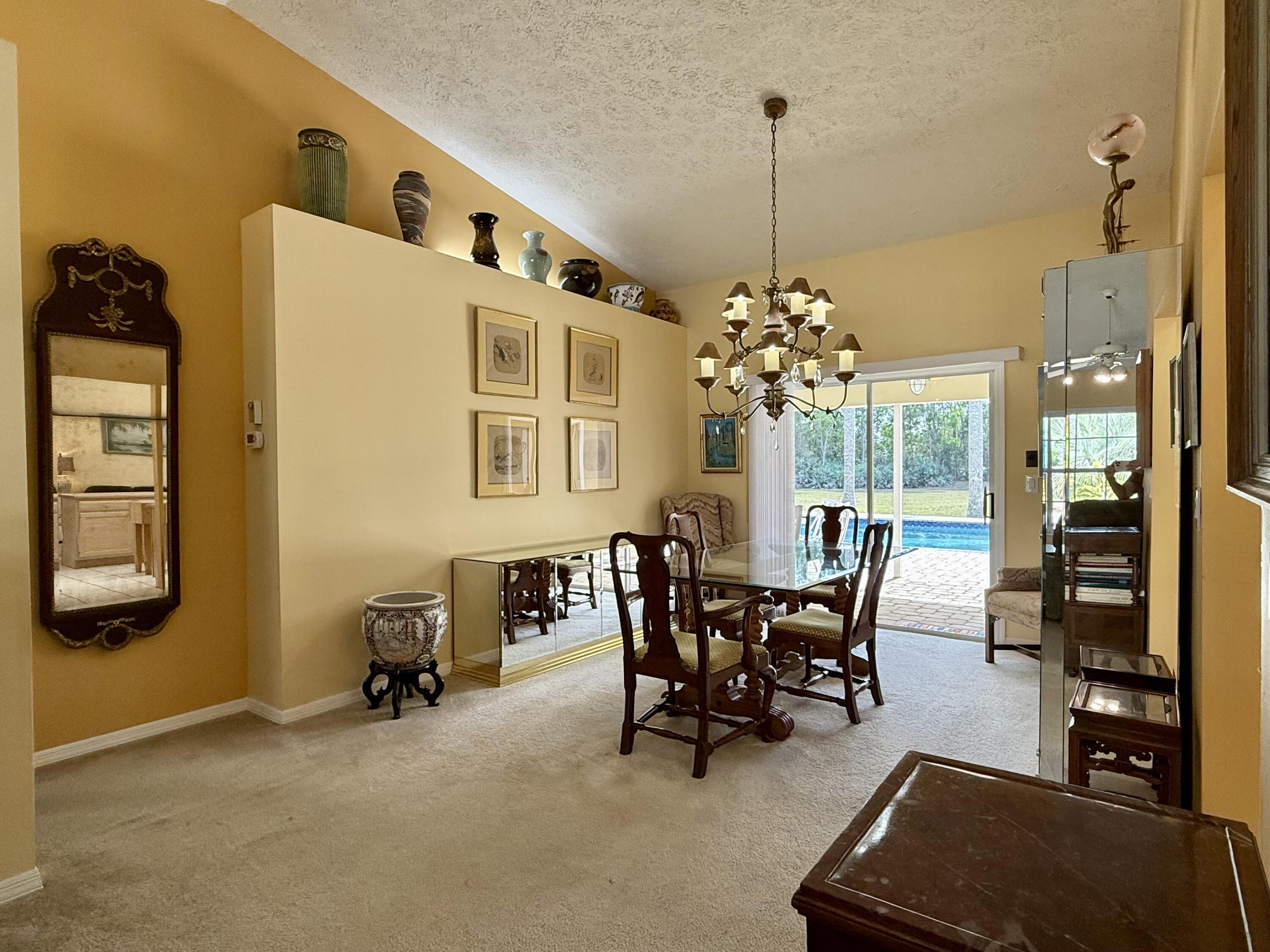 2884 Southeast Ranch Acres Circle Jupiter, FL 33478 - Photo 34 of 93 dining room to pool