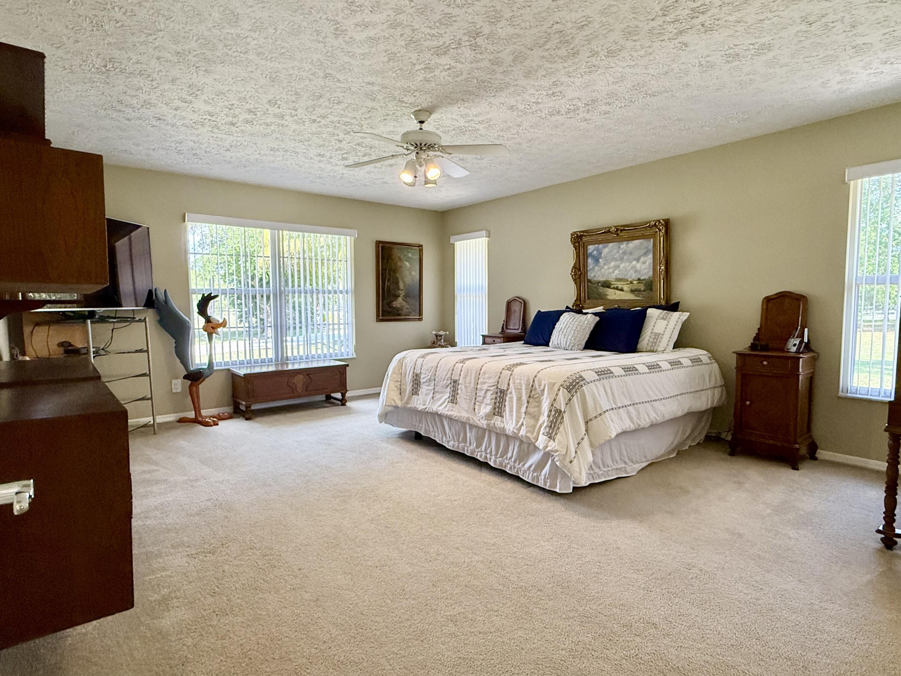 2884 Southeast Ranch Acres Circle Jupiter, FL 33478 - Photo 40 of 93 bedroom 1