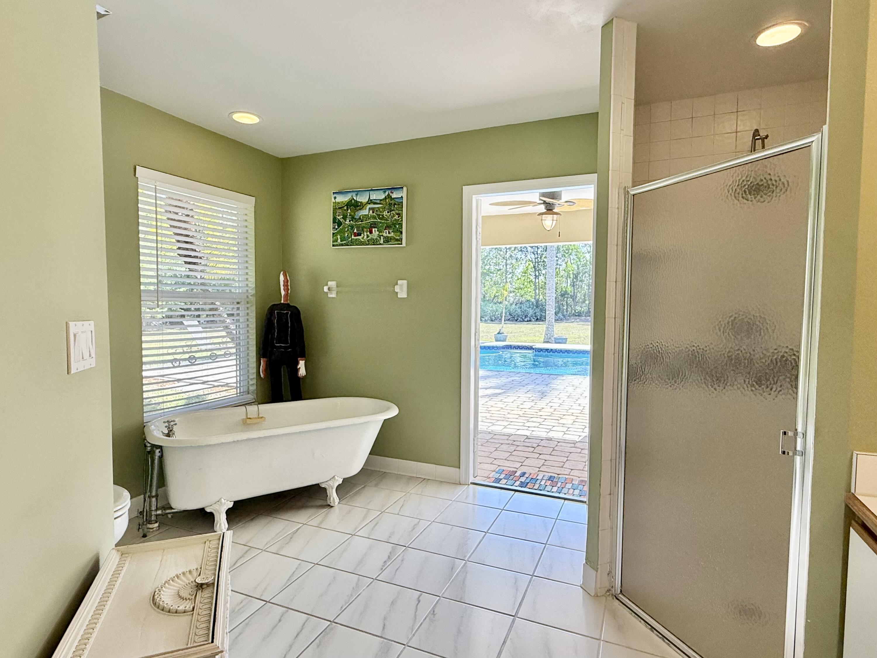 2884 Southeast Ranch Acres Circle Jupiter, FL 33478 - Photo 51 of 93 bathroom 1