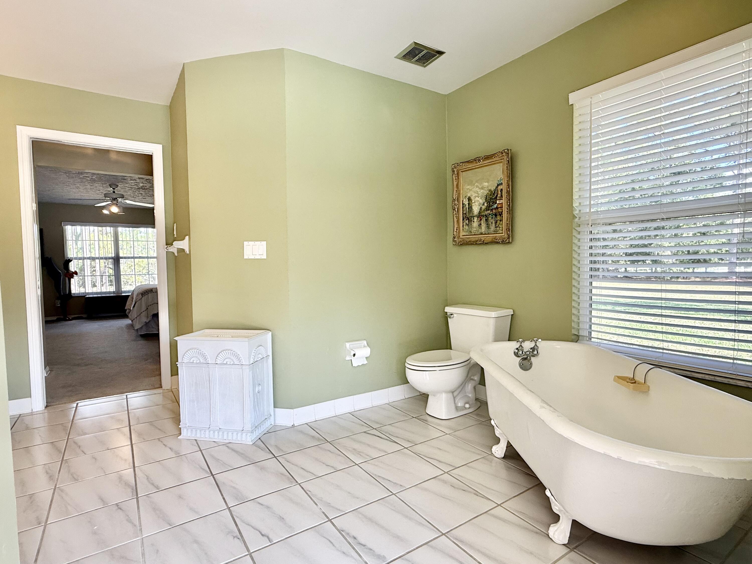 2884 Southeast Ranch Acres Circle Jupiter, FL 33478 - Photo 54 of 93 bathroom 1
