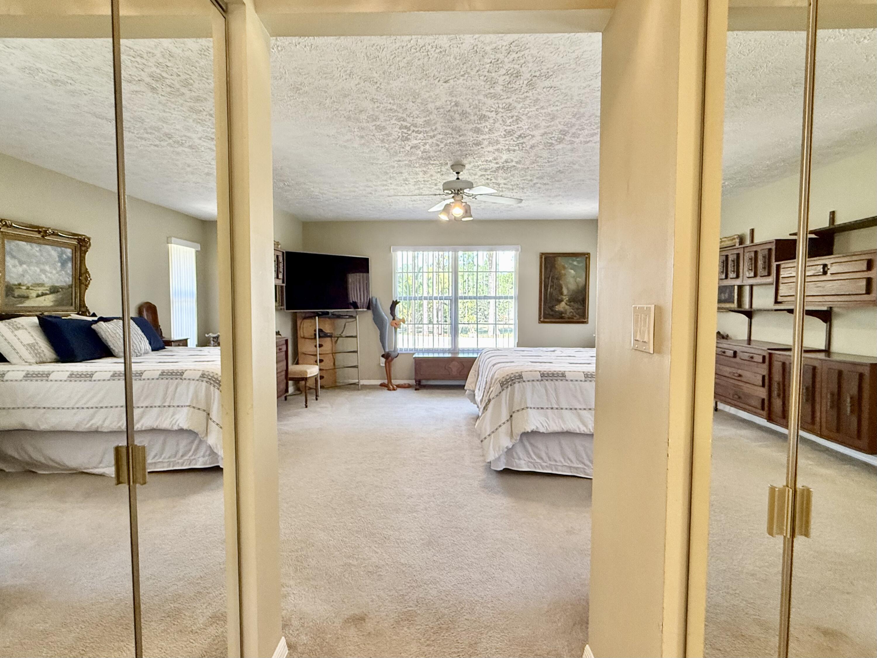 2884 Southeast Ranch Acres Circle Jupiter, FL 33478 - Photo 56 of 93 master closets