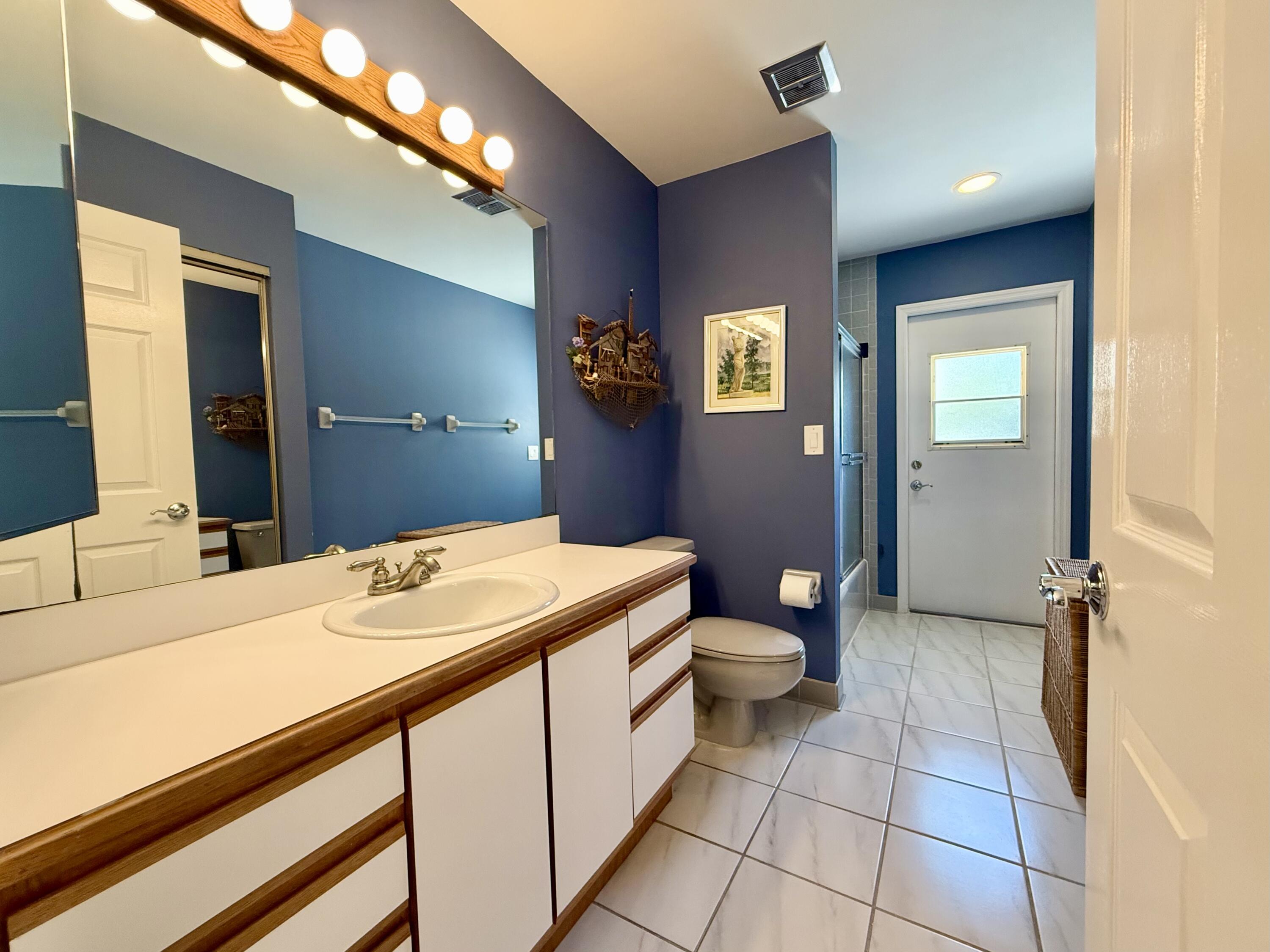 2884 Southeast Ranch Acres Circle Jupiter, FL 33478 - Photo 59 of 93 bathroom 2