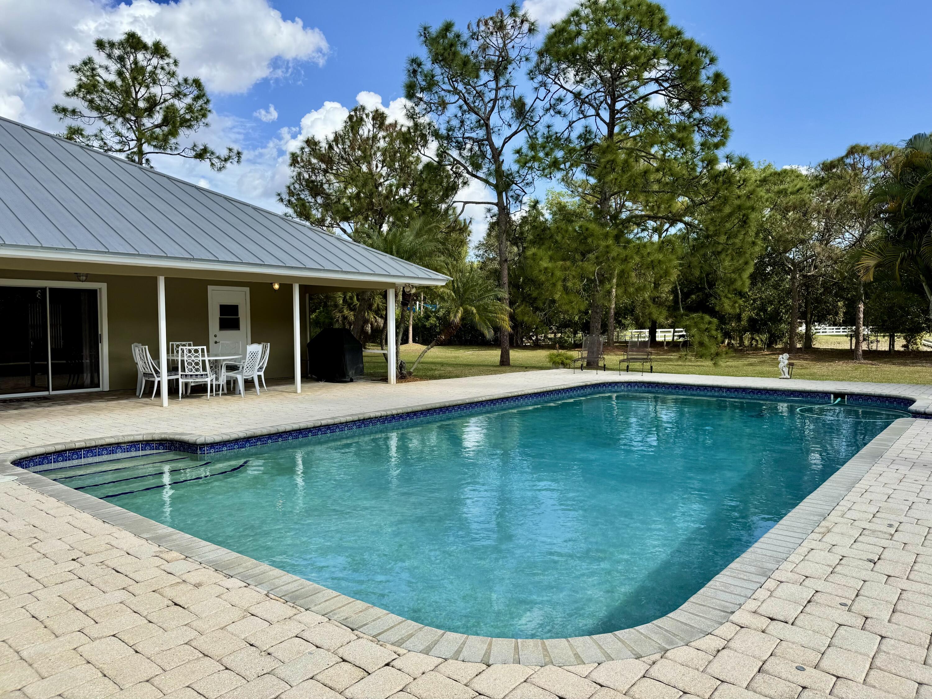 2884 Southeast Ranch Acres Circle Jupiter, FL 33478 - Photo 70 of 93 pool
