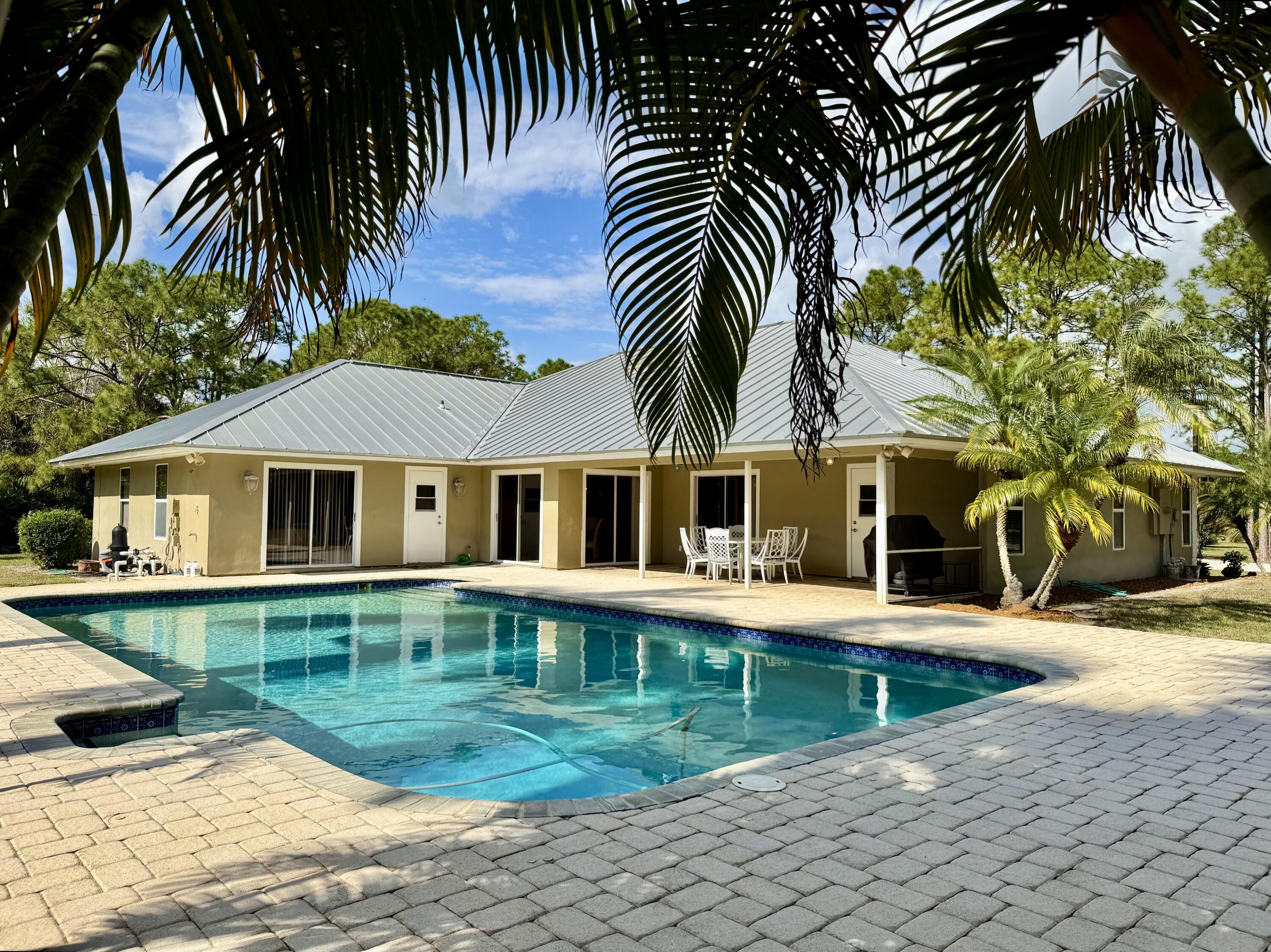 2884 Southeast Ranch Acres Circle Jupiter, FL 33478 - Photo 7 of 93 pool