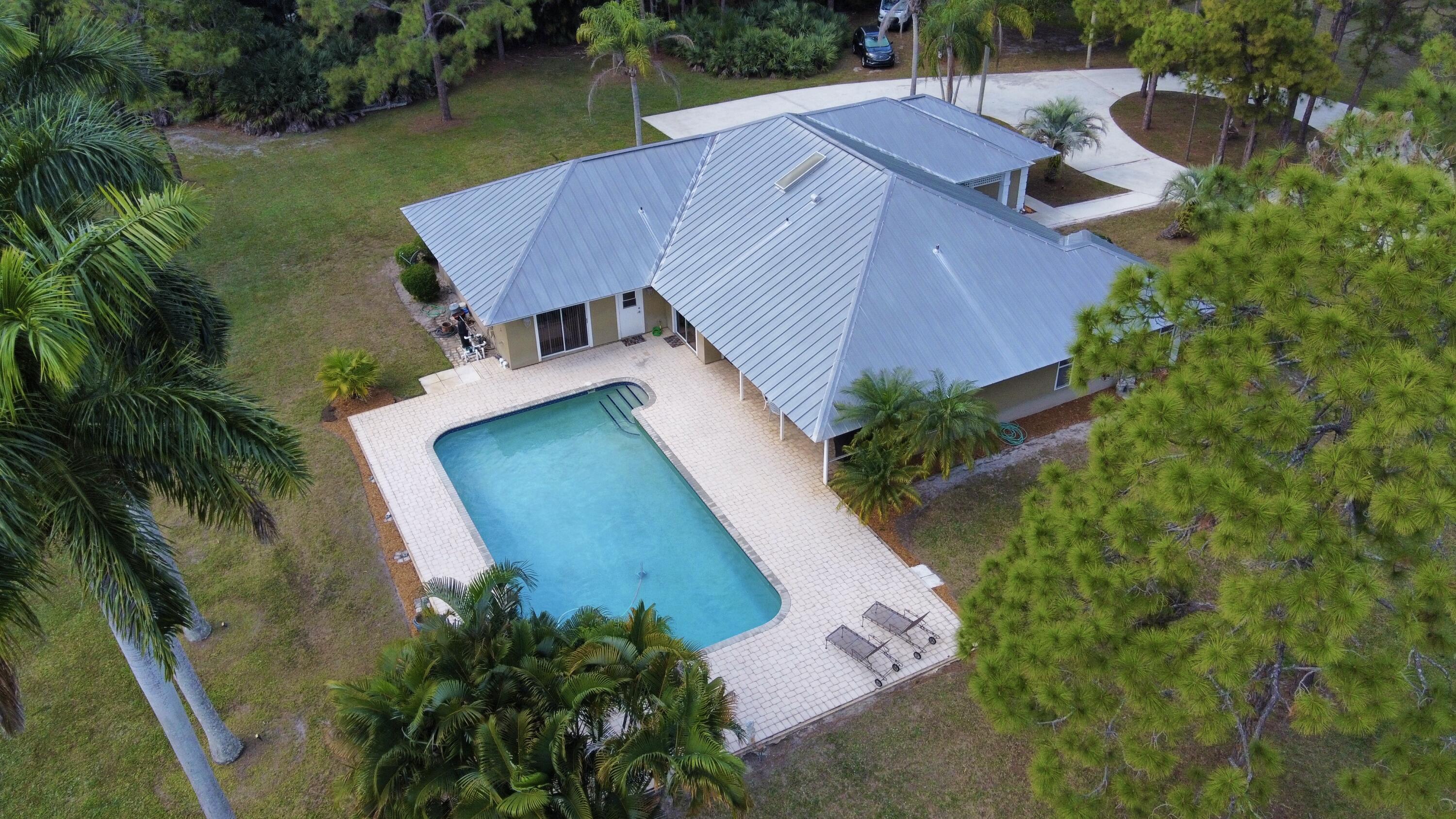 2884 Southeast Ranch Acres Circle Jupiter, FL 33478 - Photo 80 of 93 aerial pool