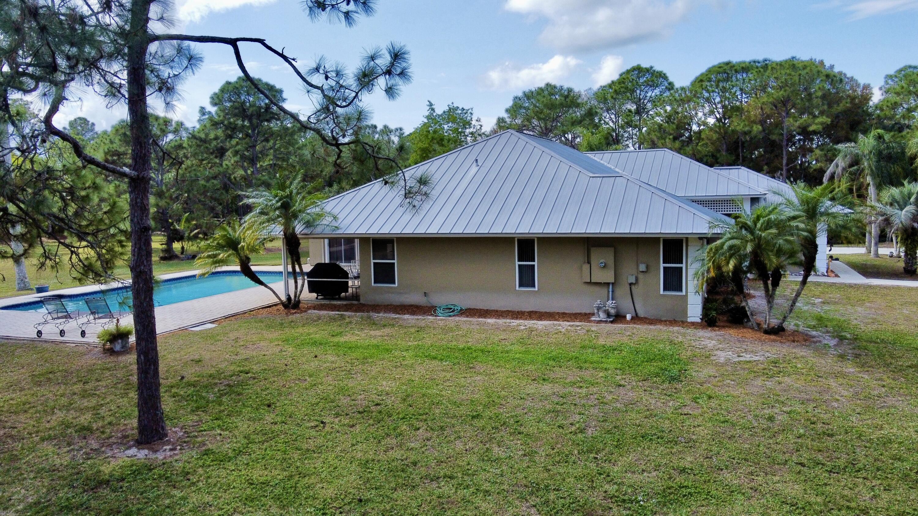 2884 Southeast Ranch Acres Circle Jupiter, FL 33478 - Photo 81 of 93 aerial side