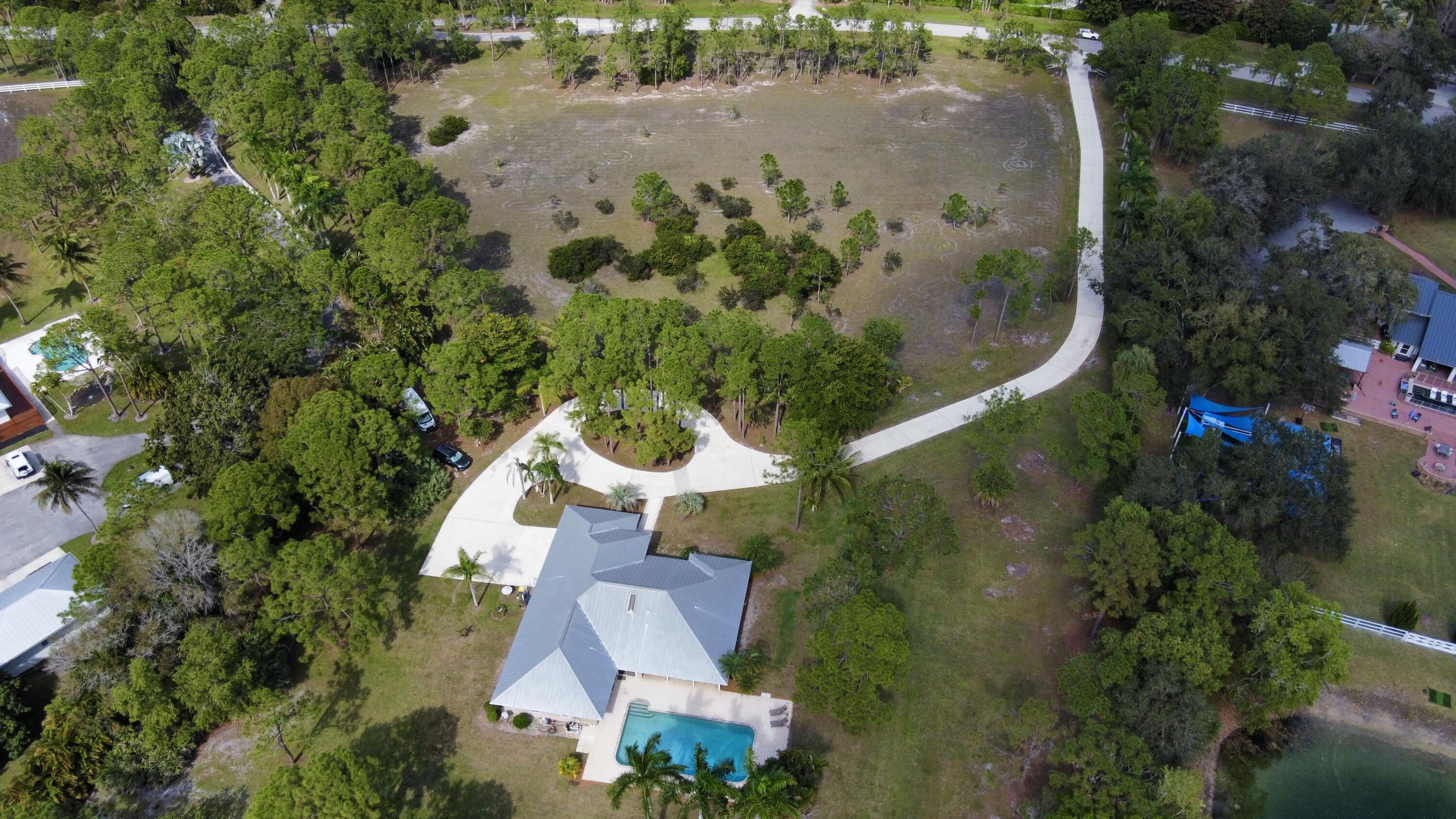 2884 Southeast Ranch Acres Circle Jupiter, FL 33478 - Photo 83 of 93 aerial front
