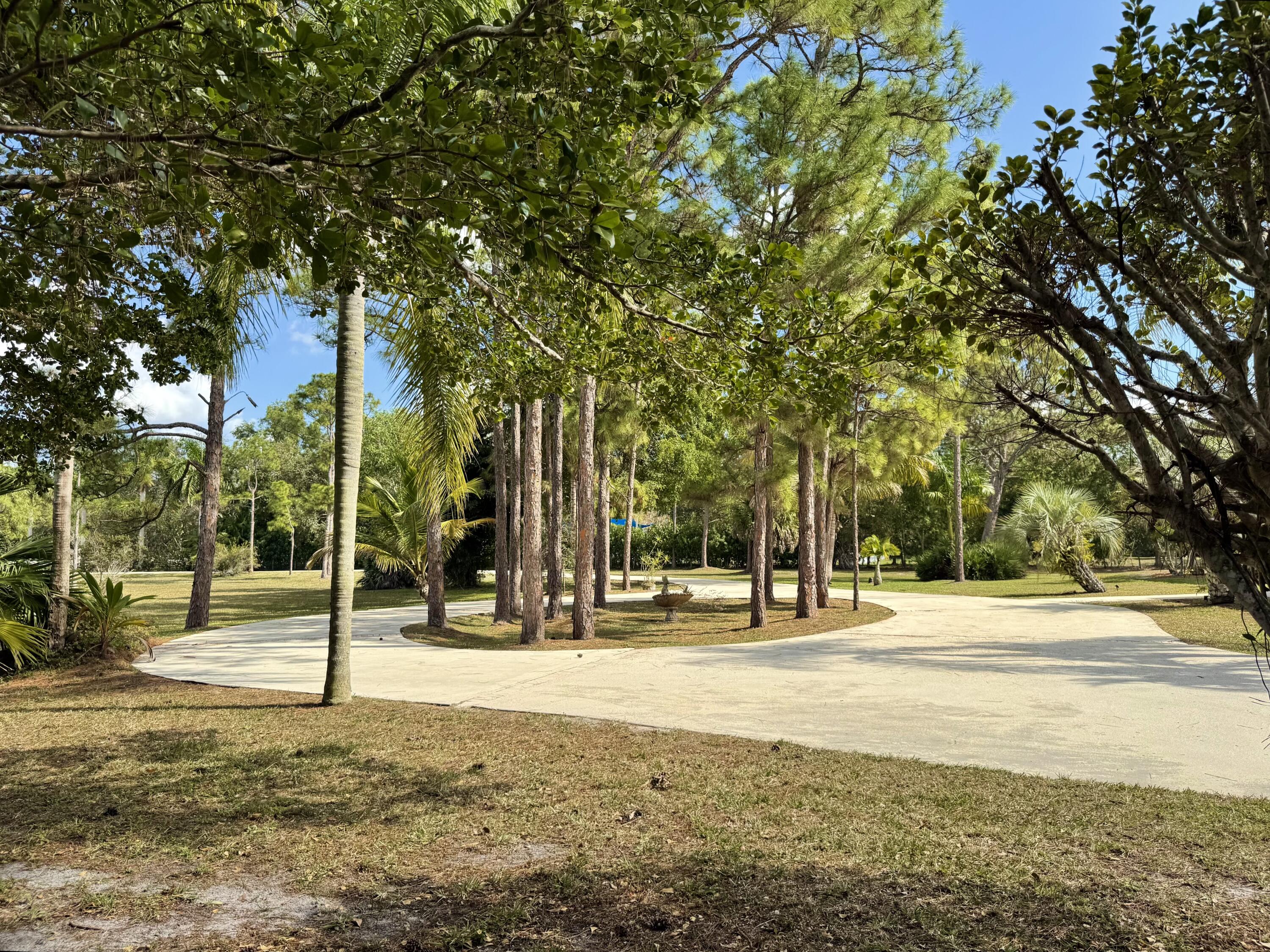 2884 Southeast Ranch Acres Circle Jupiter, FL 33478 - Photo 84 of 93 circular drive