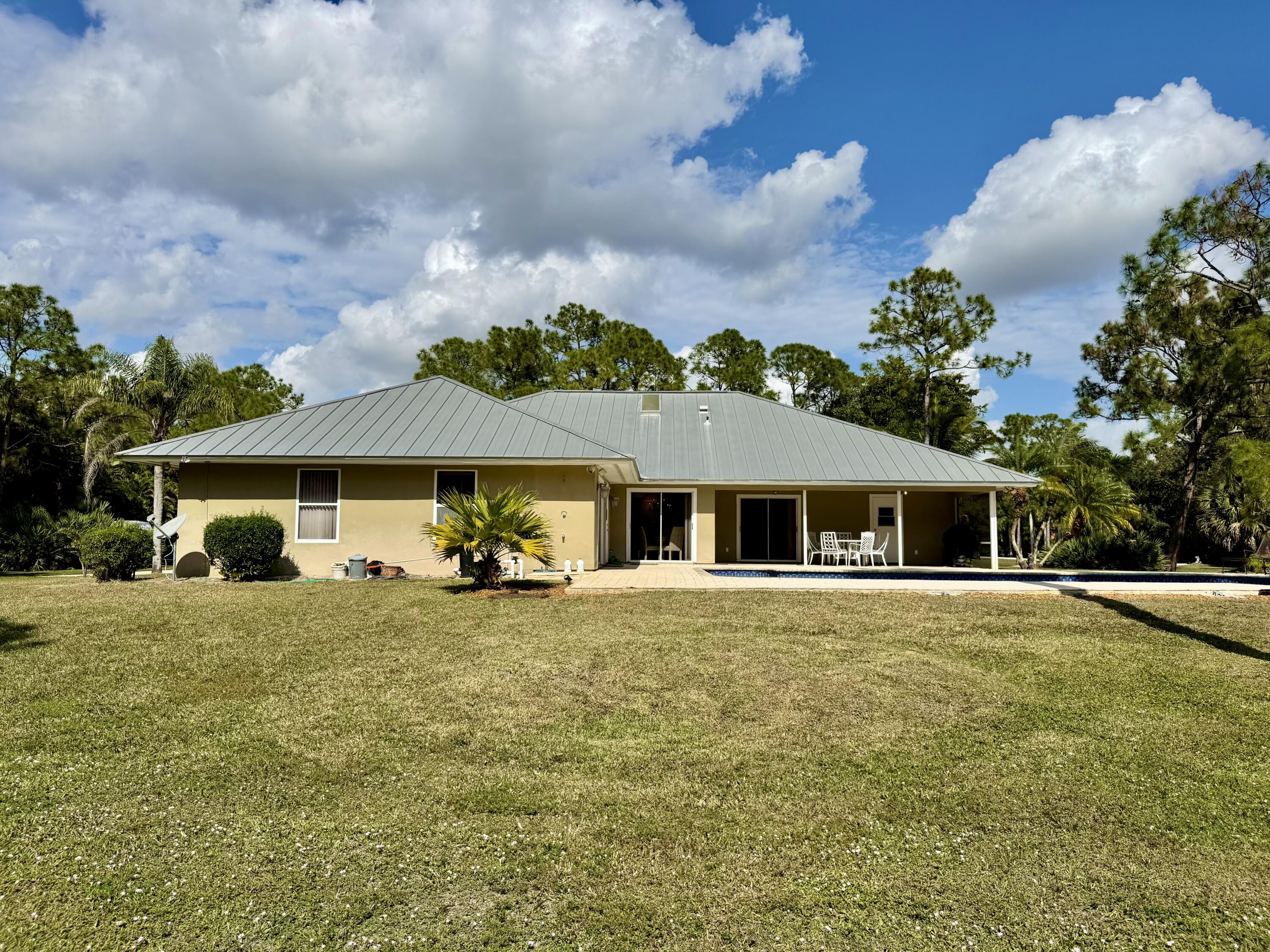 2884 Southeast Ranch Acres Circle Jupiter, FL 33478 - Photo 88 of 93 back