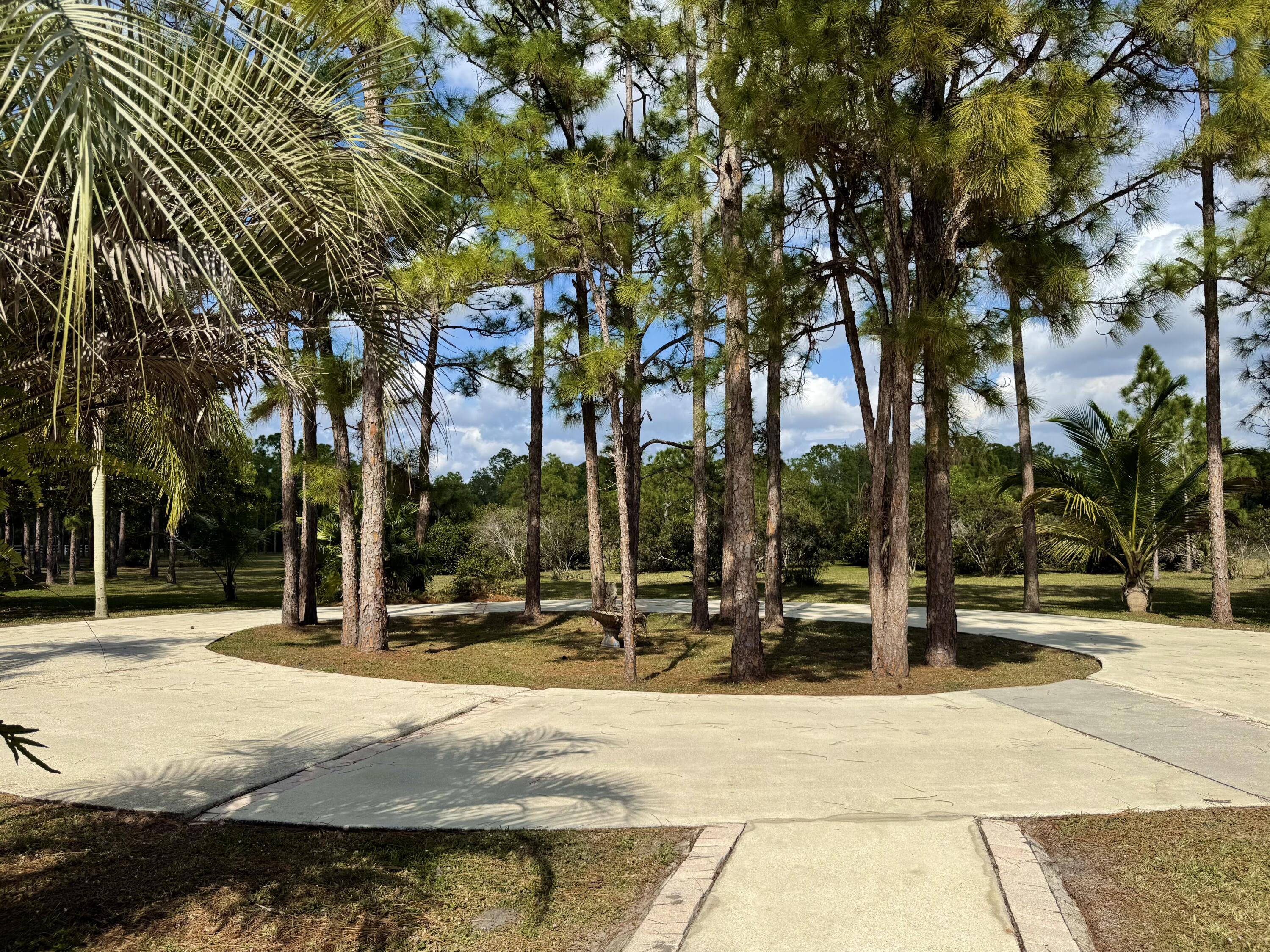 2884 Southeast Ranch Acres Circle Jupiter, FL 33478 - Photo 90 of 93 circular drive