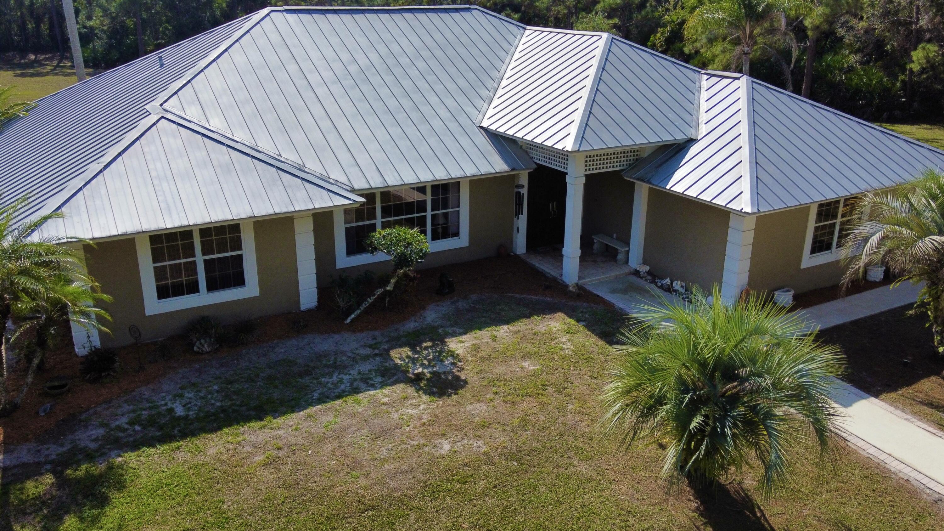 2884 Southeast Ranch Acres Circle Jupiter, FL 33478 - Photo 91 of 93 aerial front