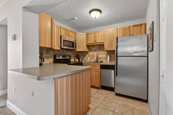 $259,900 | 9 Treetop Circle, Unit 111, Laconia, NH 03246