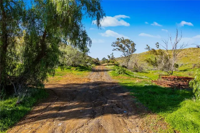 a view of a backyard of the house