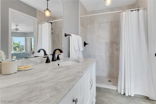 a view of bathroom with dual sinks