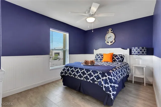 a bedroom with a bed and a table