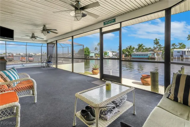 a view of a lake with sitting area and lake view