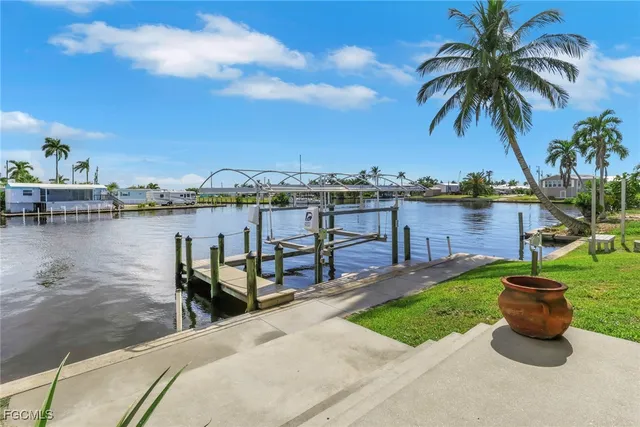 a view of a lake with a house