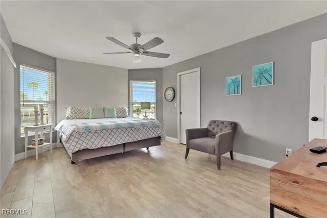 a bedroom with a bed and a couch