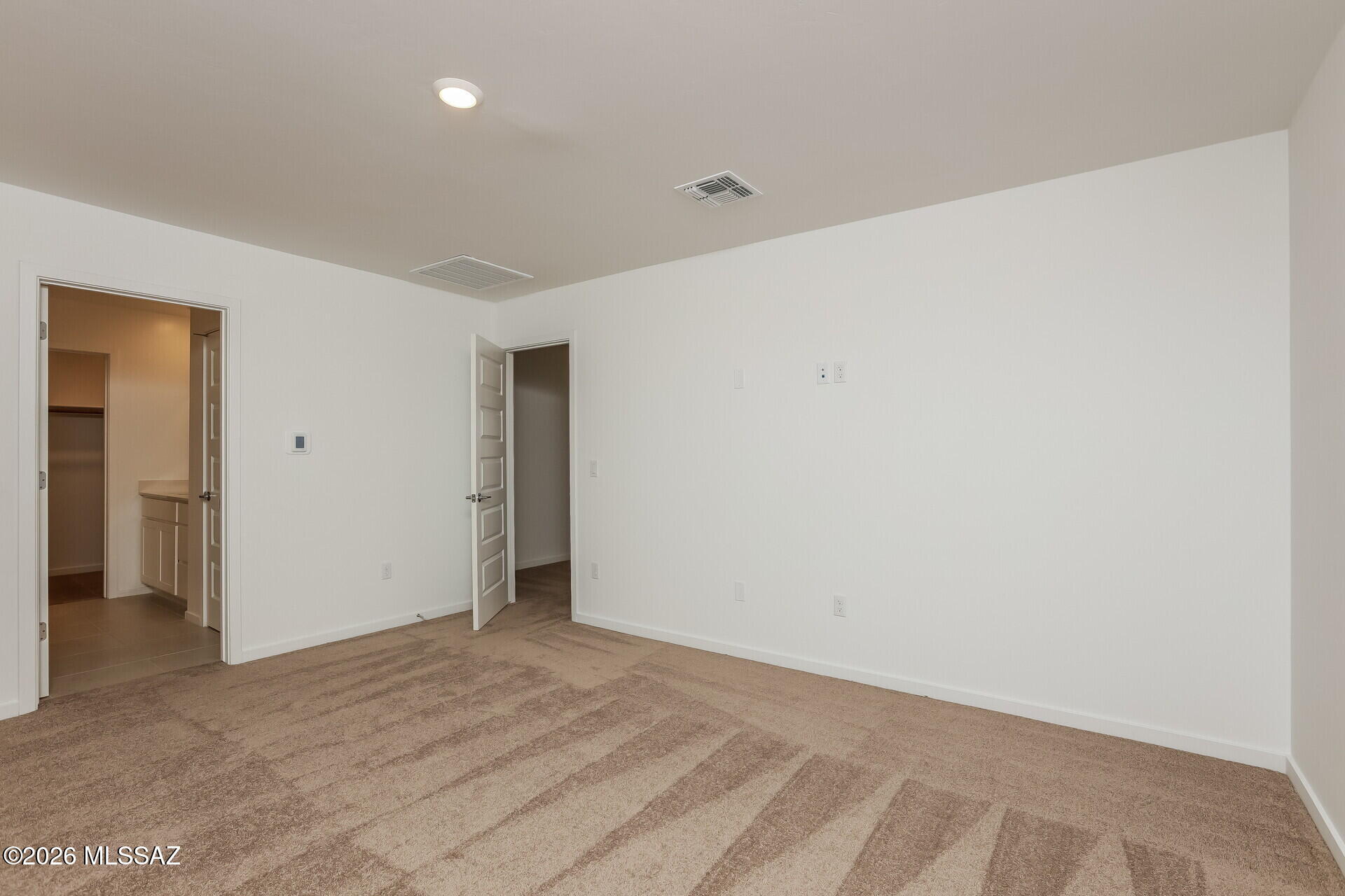 7068 West Indian Clover Way Tucson, AZ 85757 - Photo 9 of 17 9-photo-Main-Bedroom-1e81147c-3dd9-421a-