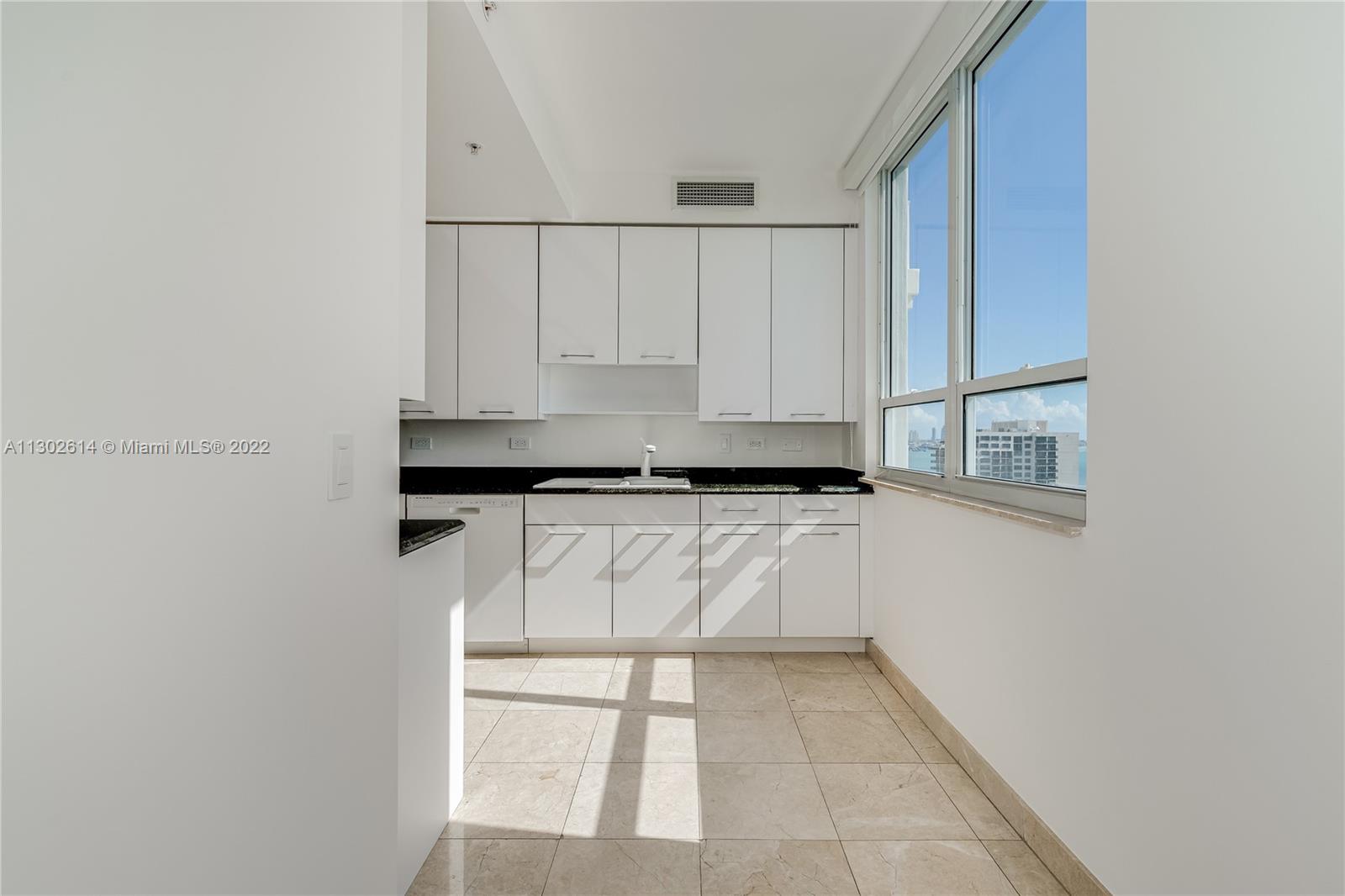 801 Brickell Key Boulevard, Unit 1701 Miami, FL 33131 - Photo 12 of 32 a view of an empty room