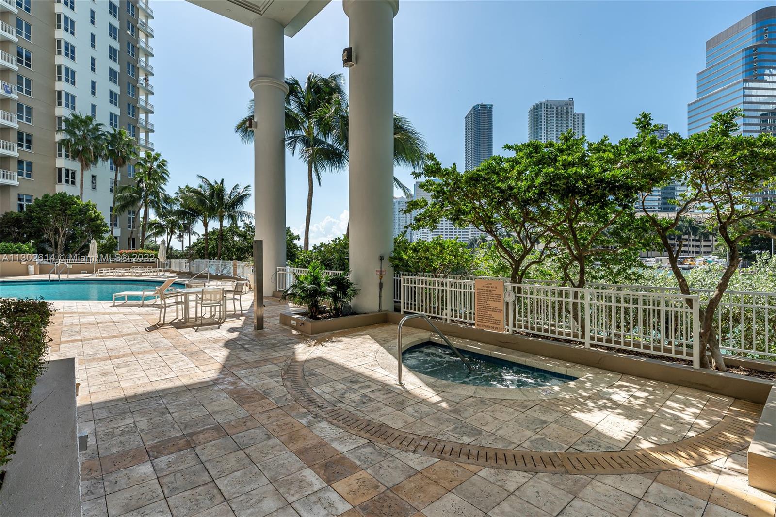 801 Brickell Key Boulevard, Unit 1701 Miami, FL 33131 - Photo 26 of 32 a view of a backyard with a garden and plants