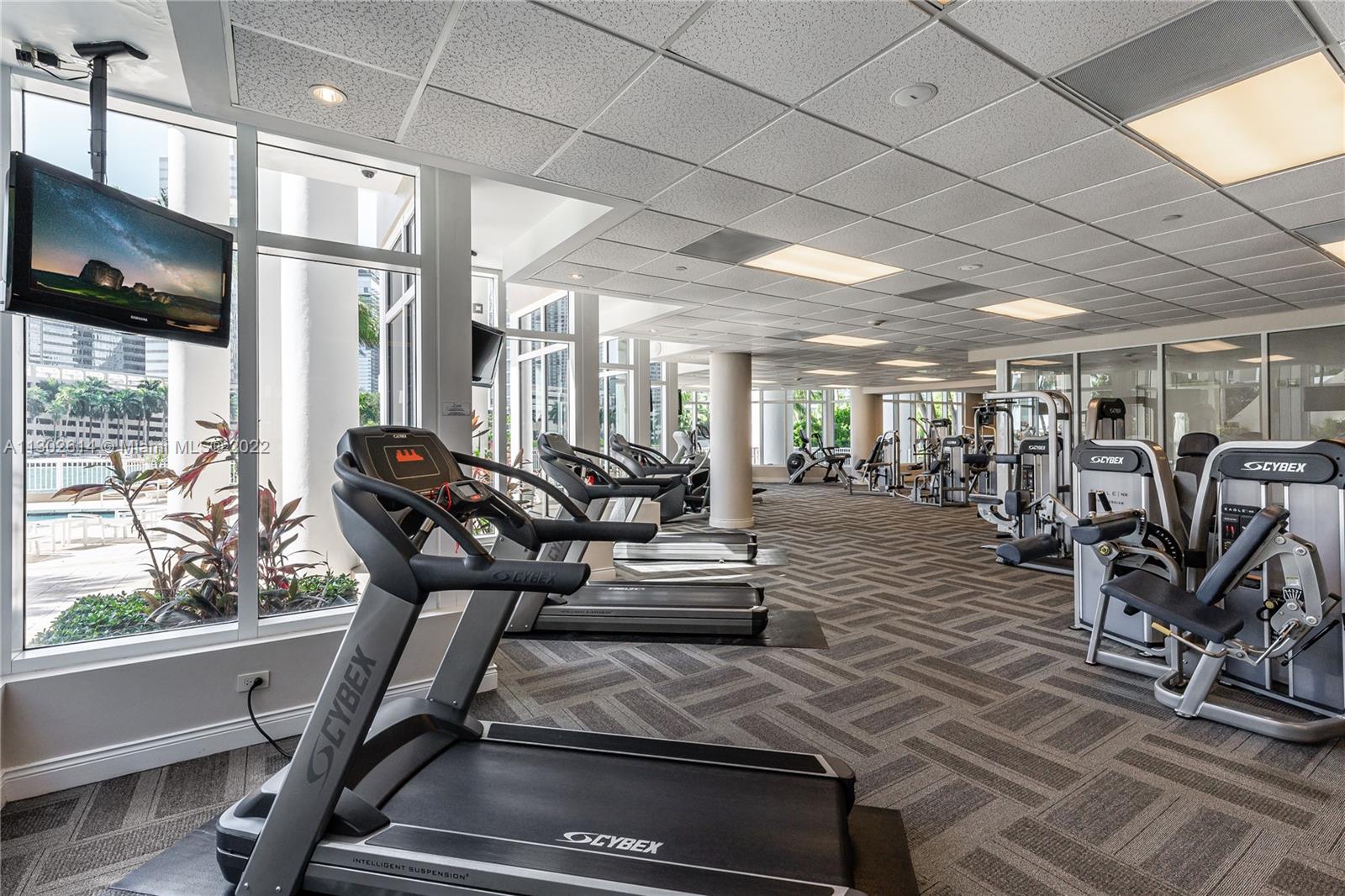 801 Brickell Key Boulevard, Unit 1701 Miami, FL 33131 - Photo 29 of 32 a view of a room with gym equipment