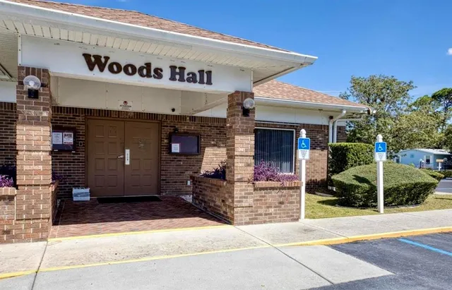 a front view of a building with street view