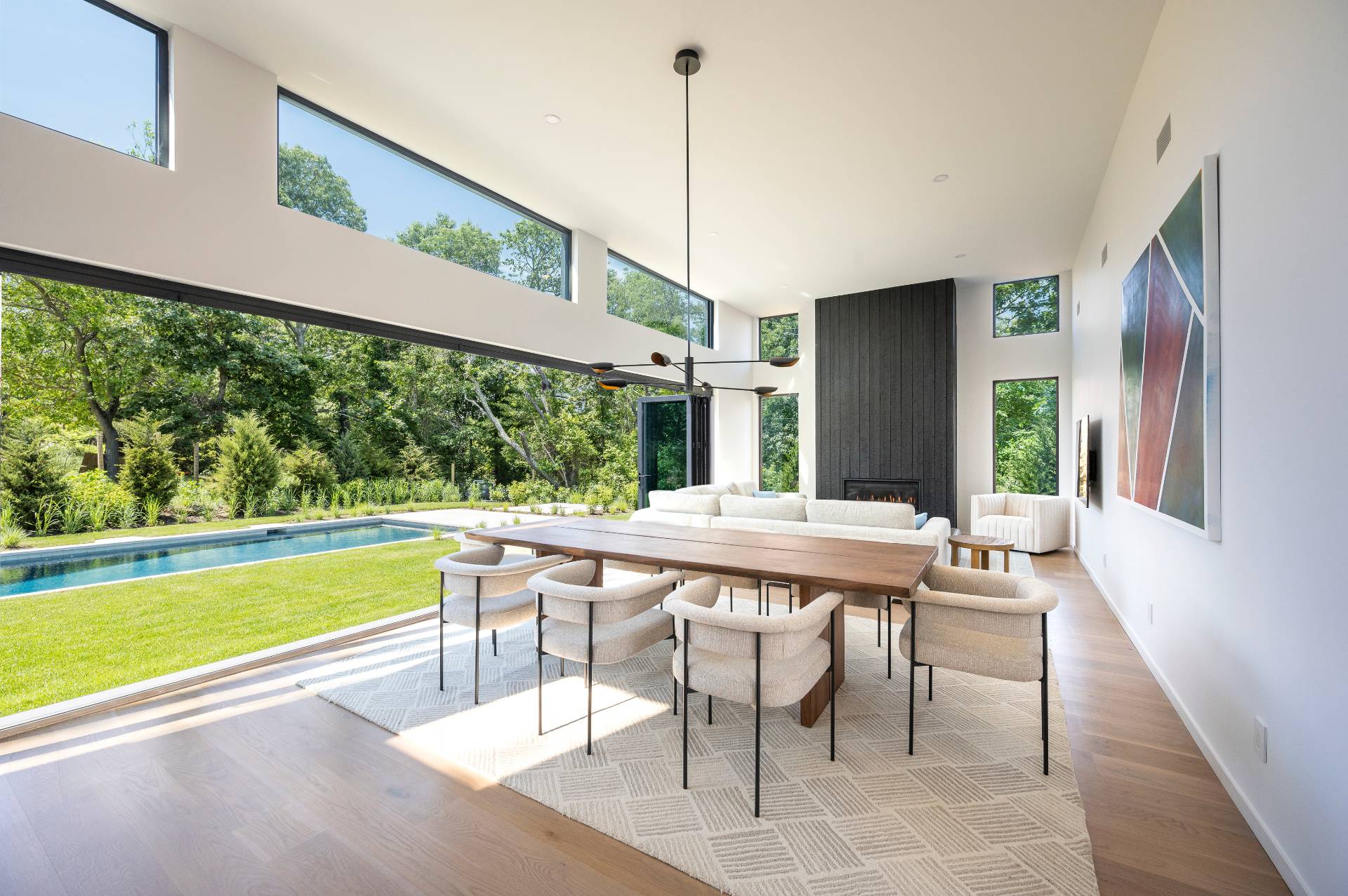 5 Ridge Lane Hampton Bays, NY 11946 - Photo 13 of 38 a dining room with furniture window and wooden floor