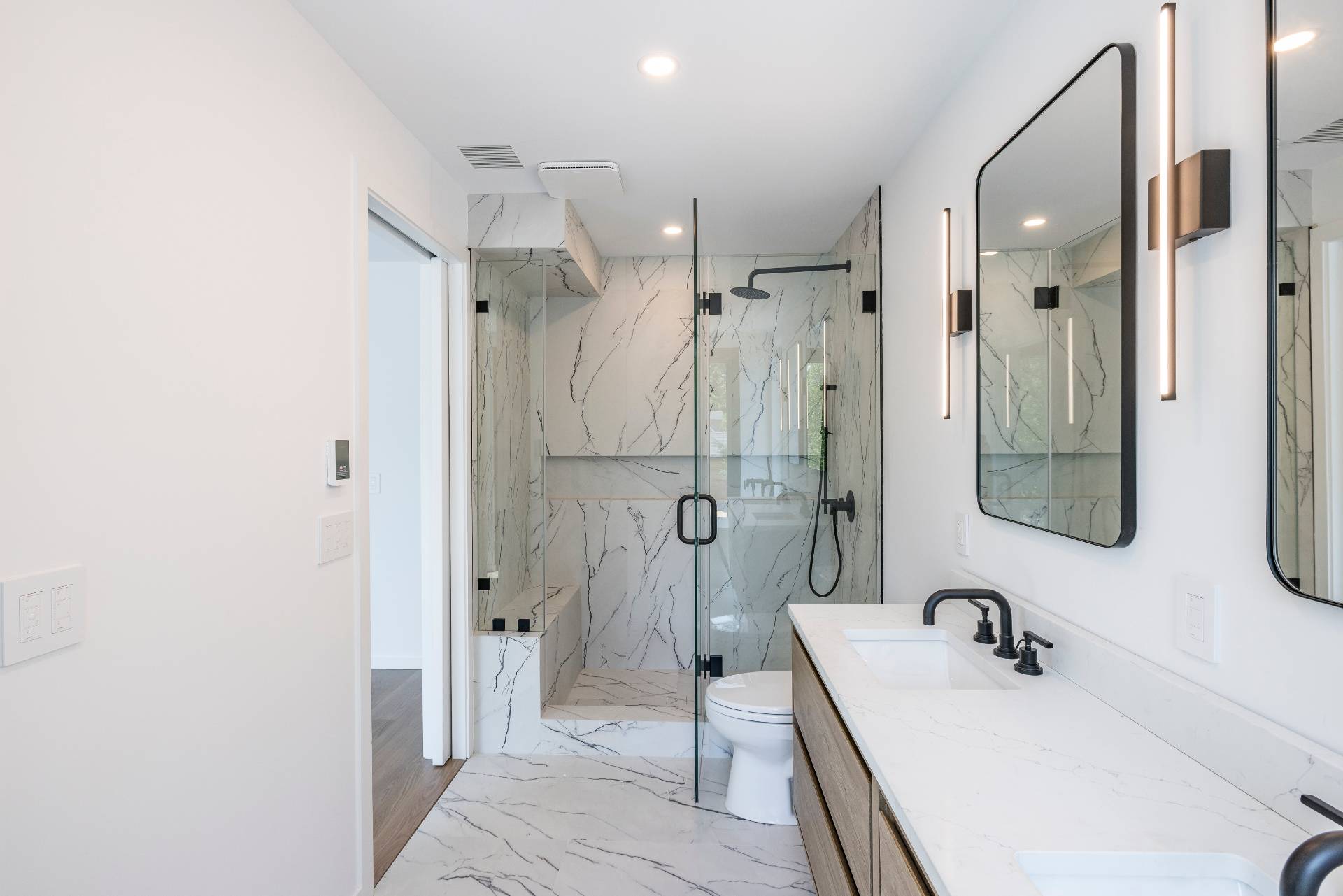 5 Ridge Lane Hampton Bays, NY 11946 - Photo 19 of 38 a bathroom with a tub sink vanity and mirror