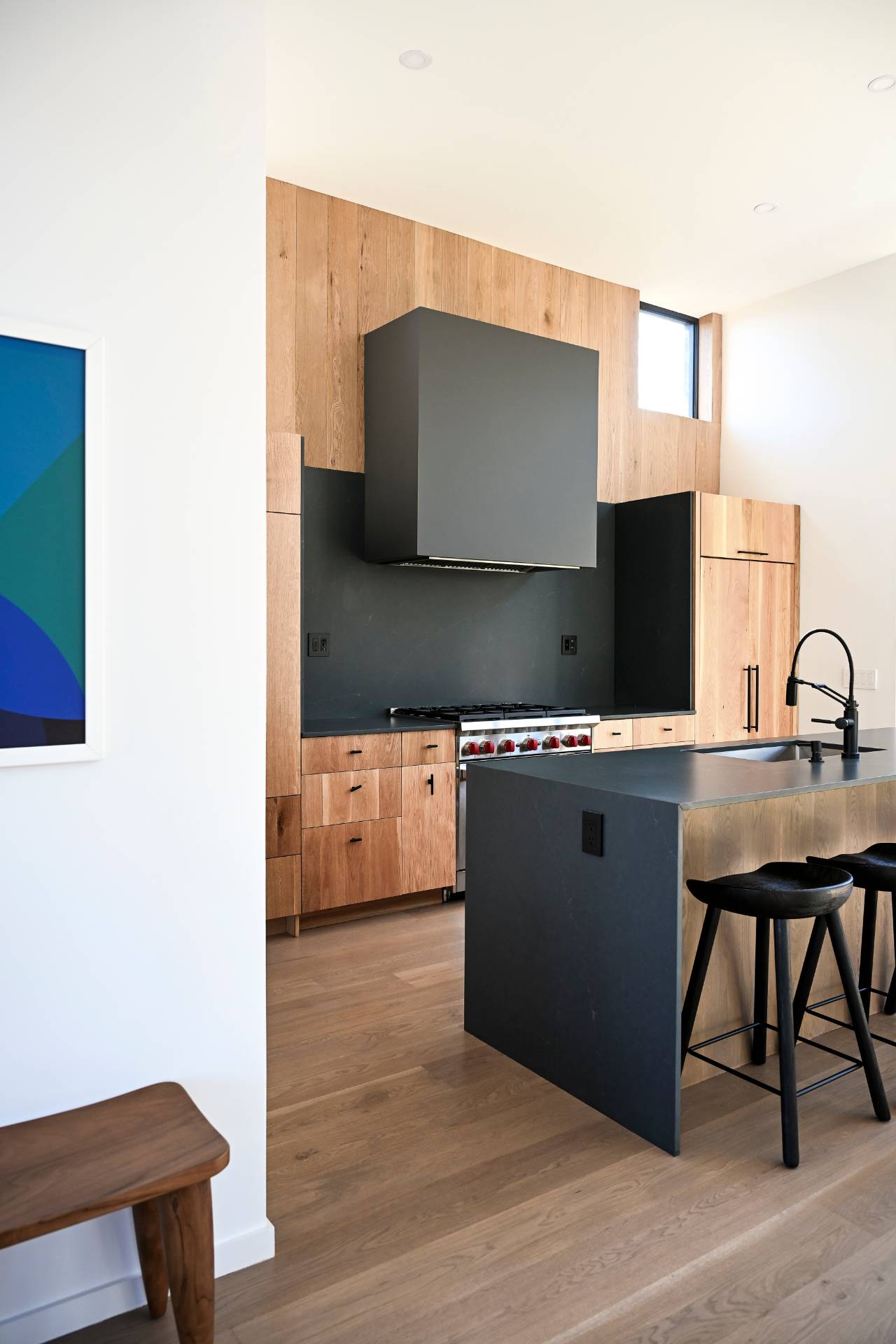 5 Ridge Lane Hampton Bays, NY 11946 - Photo 25 of 38 a living room with chair and a flat screen tv