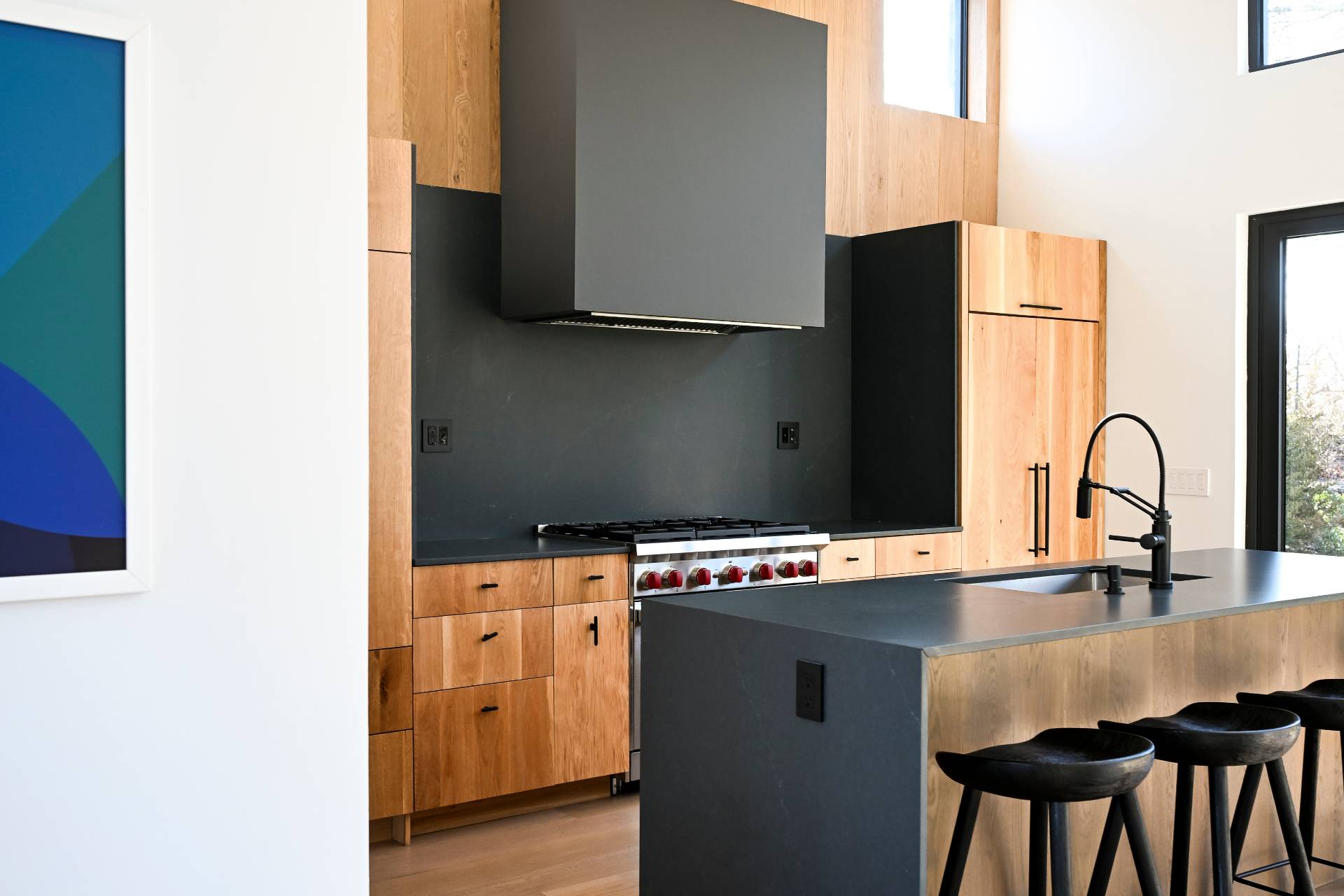 5 Ridge Lane Hampton Bays, NY 11946 - Photo 28 of 38 a kitchen with stainless steel appliances granite countertop a stove top oven a sink and dishwasher