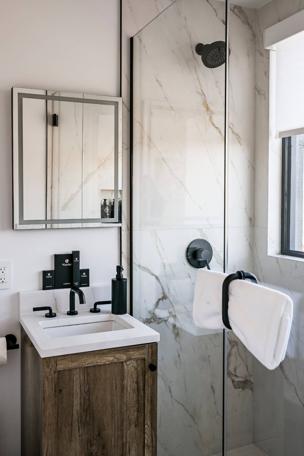 5 Ridge Lane Hampton Bays, NY 11946 - Photo 32 of 38 a bathroom with a sink a toilet and shower
