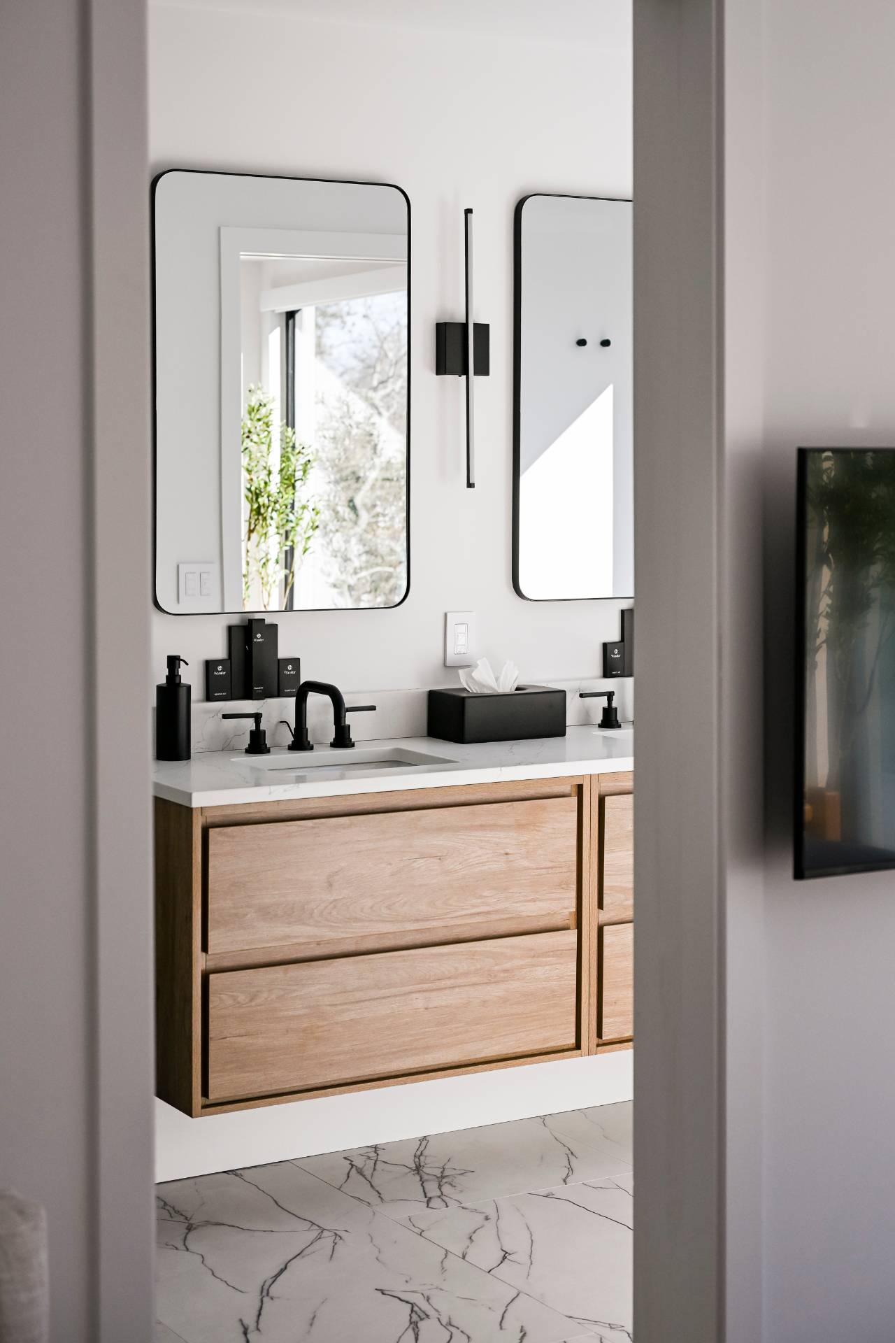 5 Ridge Lane Hampton Bays, NY 11946 - Photo 35 of 38 a bathroom with double vanity sink and a mirror
