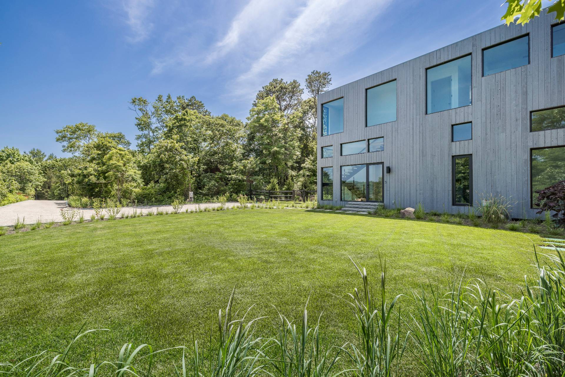 5 Ridge Lane Hampton Bays, NY 11946 - Photo 8 of 38 a view of a house with a yard