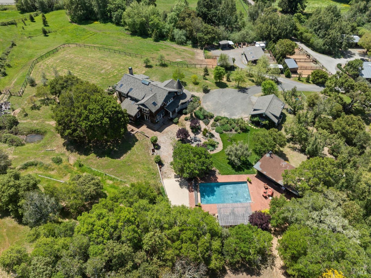 an aerial view of residential house with outdoor space