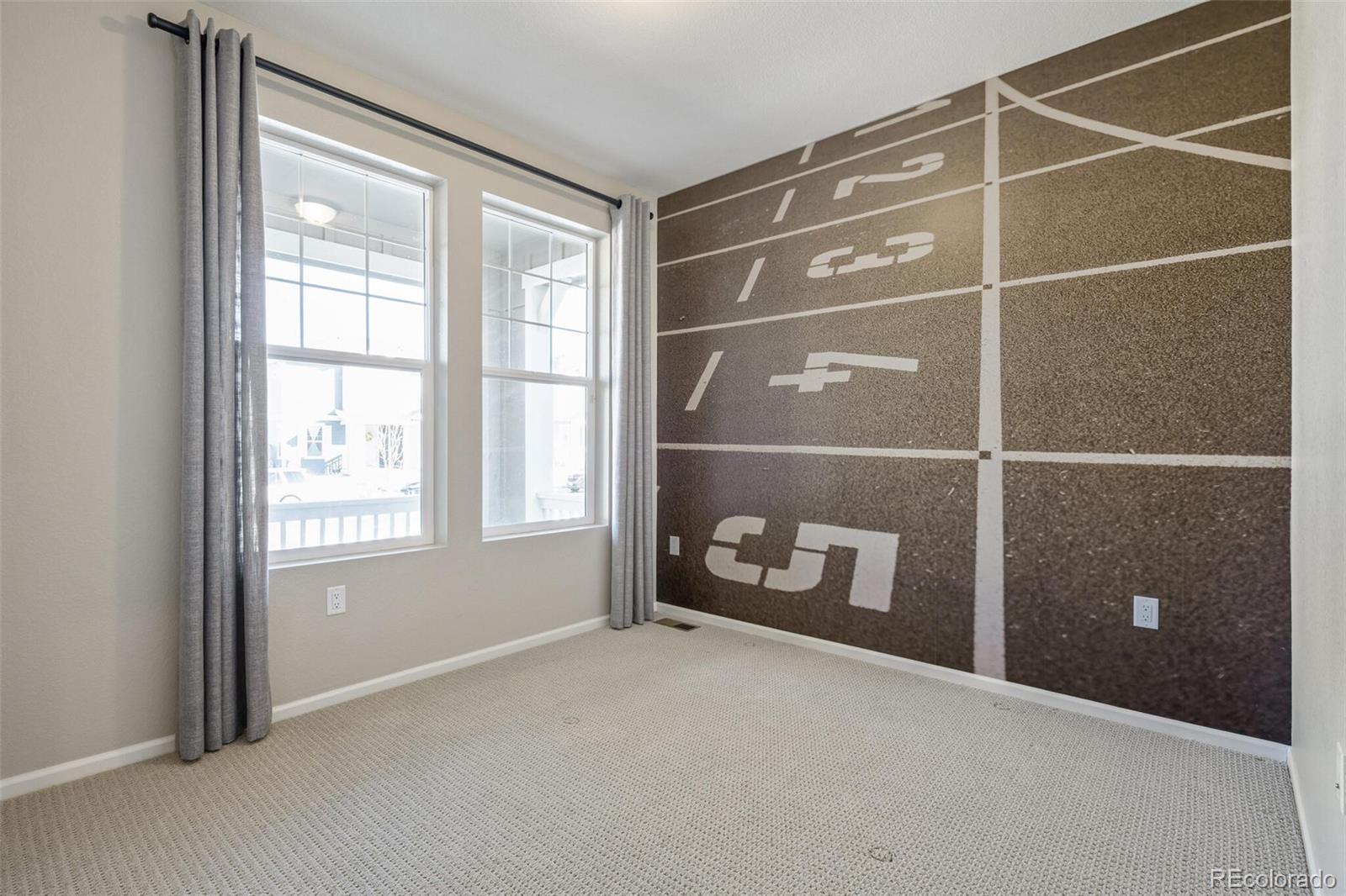 2155 Farmlore Drive Brighton, CO 80601 - Photo 29 of 41 a room with closet and windows