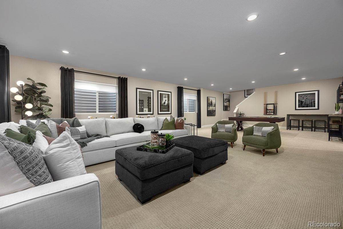 2155 Farmlore Drive Brighton, CO 80601 - Photo 3 of 41 a living room with furniture and a large window