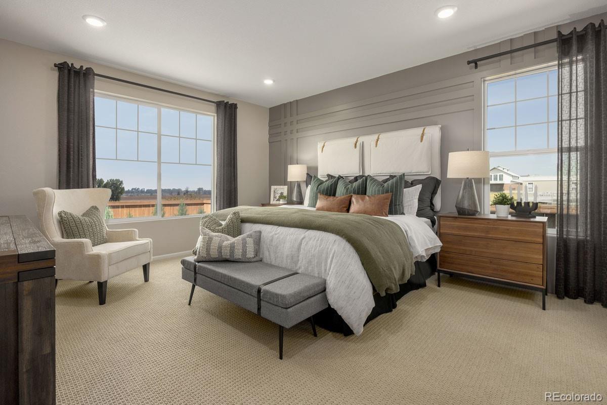 2155 Farmlore Drive Brighton, CO 80601 - Photo 7 of 41 a spacious bedroom with a bed and a large window