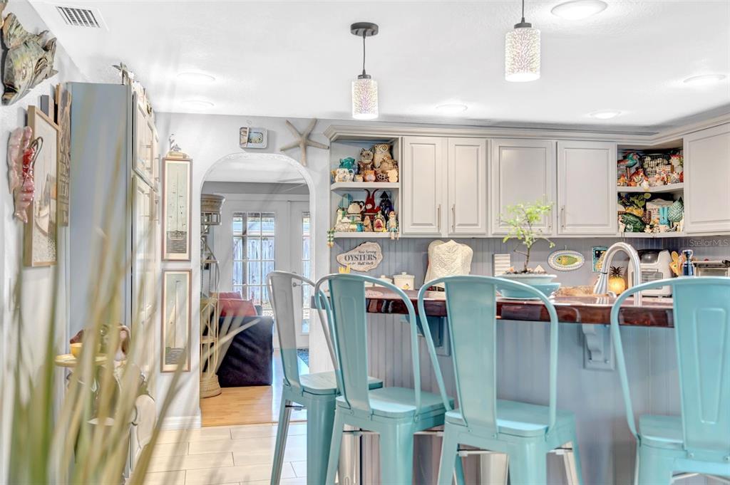 7353 Banner Street New Port Richey, FL 34653 - Photo 15 of 49 a view of a dining room with furniture window and outside view