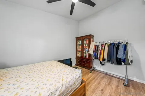 a bedroom with a bed and a walk in closet