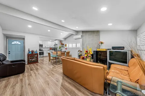 a living room with lots of furniture and appliances