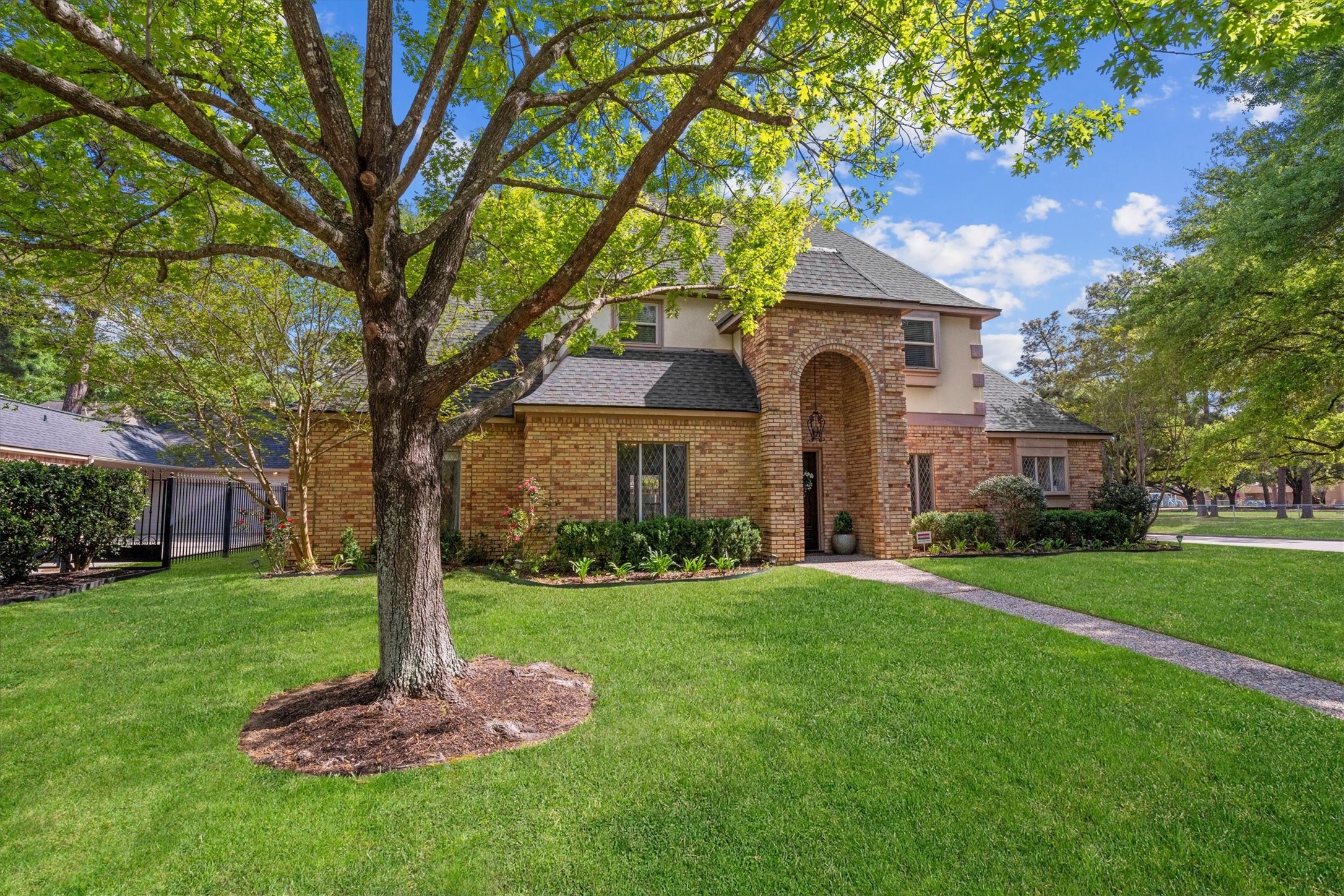 16267 Salmon Lane Spring, TX 77379 - Photo 1 of 48 Welcome to 16267 Salmon Lane, an elegant brick home with charming curb appeal in quiet, established Champion Forest.