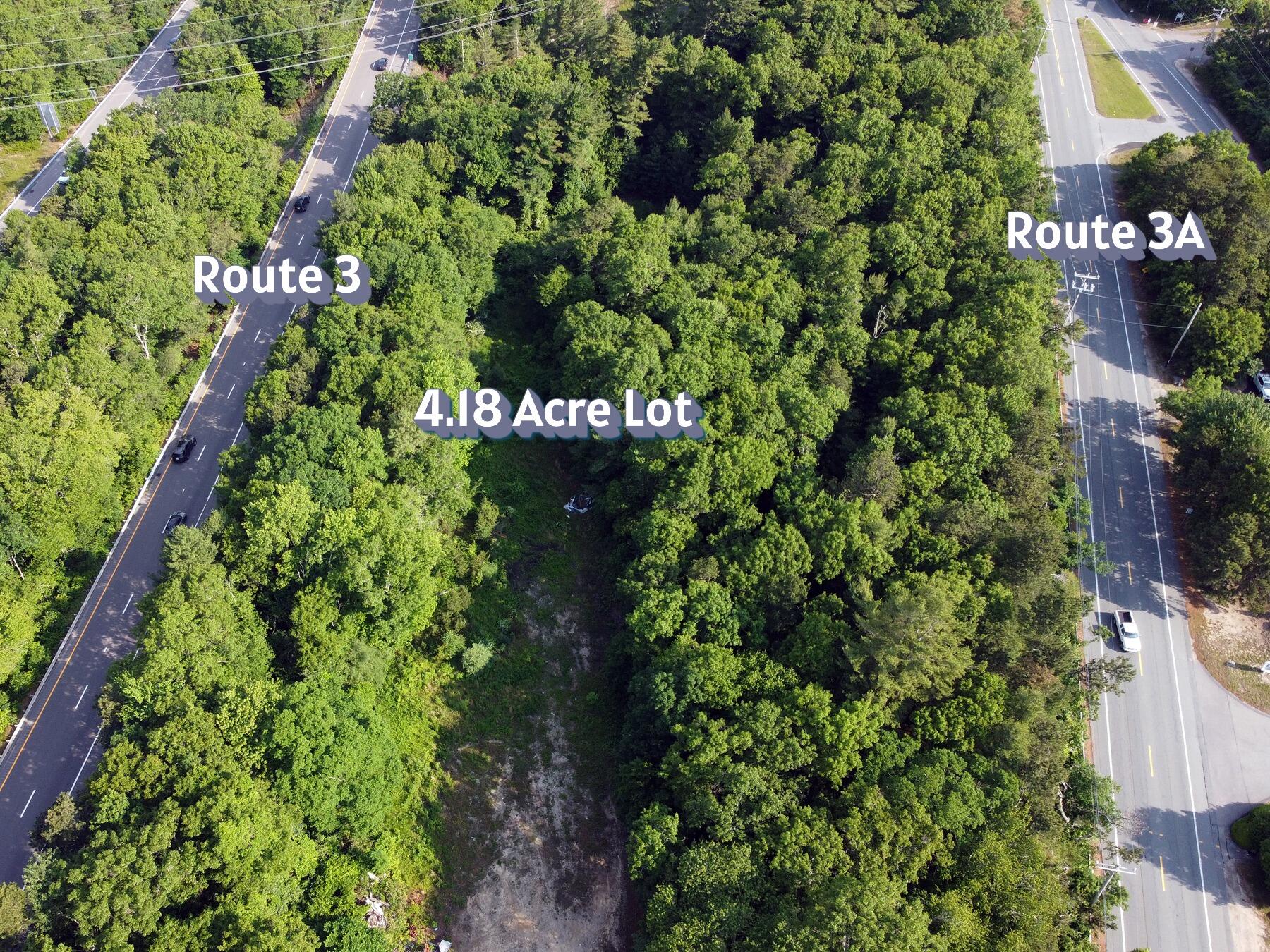 0 State Road Sagamore Beach, MA 02562 - Photo 1 of 14 a sign that is sitting in a forest