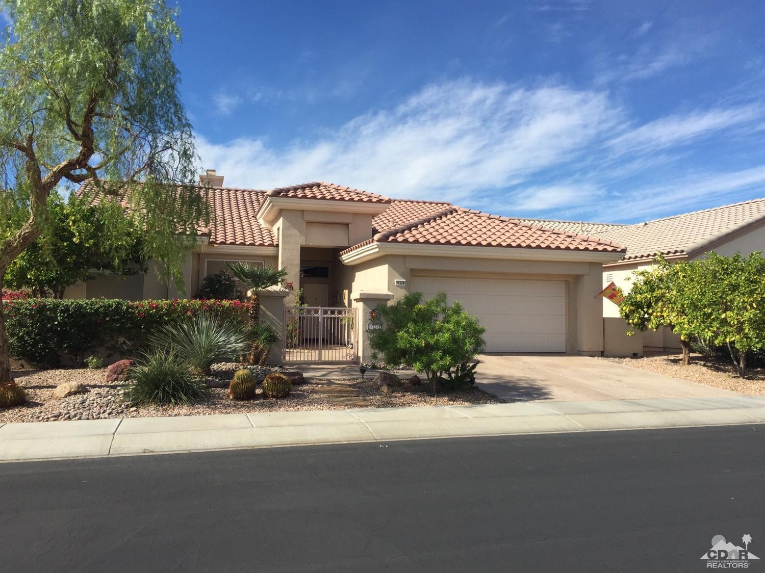 37339 Skycrest Road Palm Desert, CA 92211 - Photo 1 of 39 a front view of a house with a yard