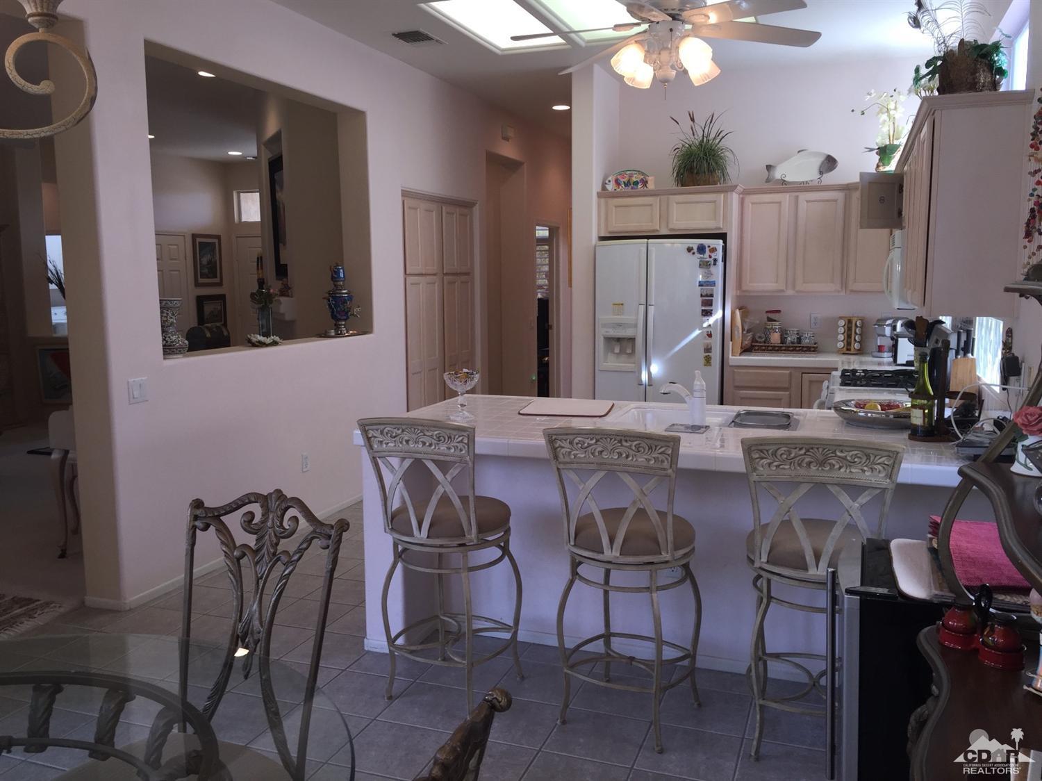 37339 Skycrest Road Palm Desert, CA 92211 - Photo 13 of 39 a view of a dining room with furniture