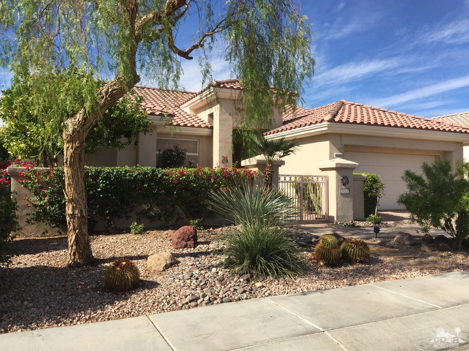 37339 Skycrest Road Palm Desert, CA 92211 - Photo 2 of 39 a view of a house with a yard