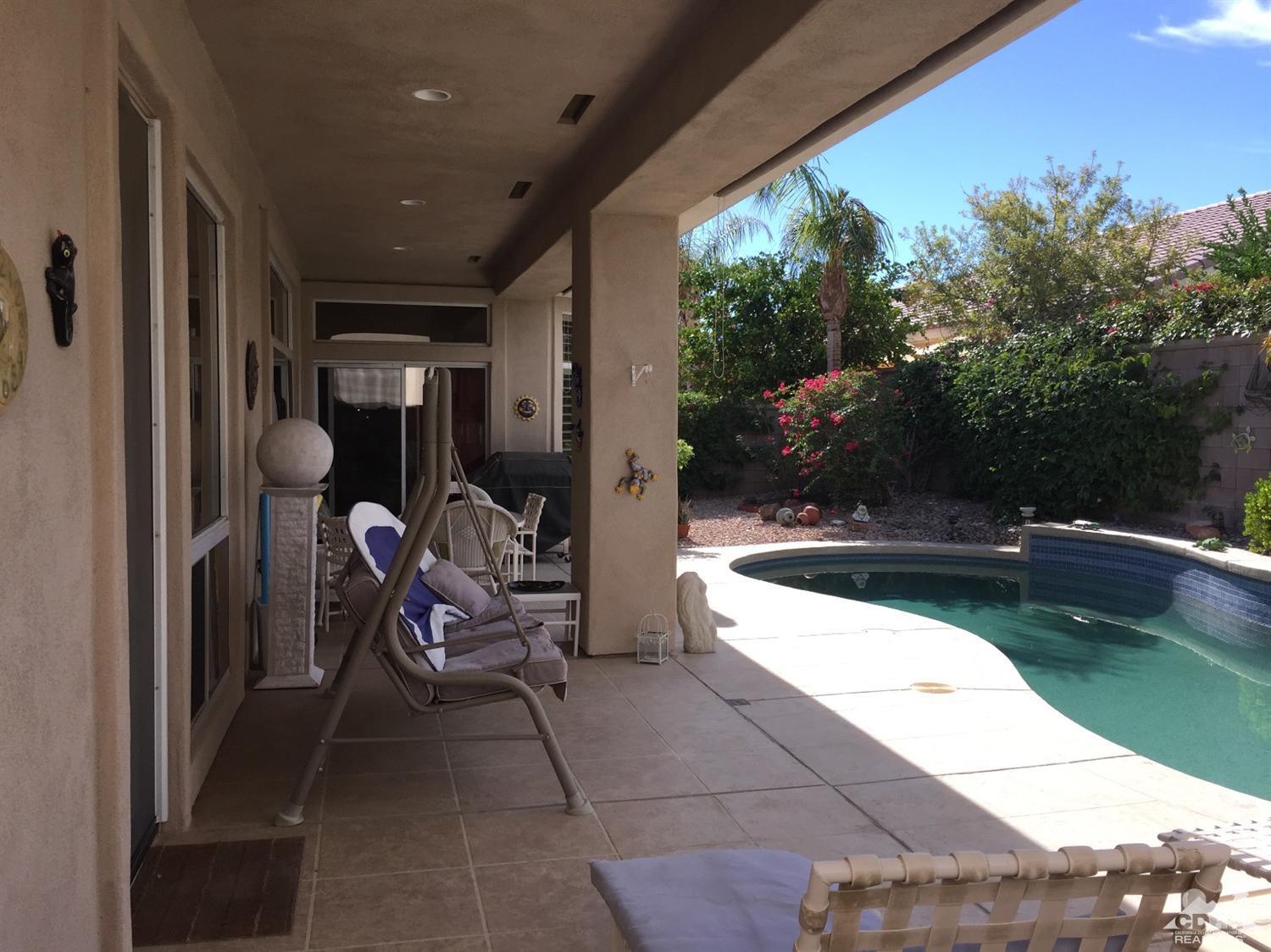 37339 Skycrest Road Palm Desert, CA 92211 - Photo 35 of 39 a view of swimming pool from a lounge chair
