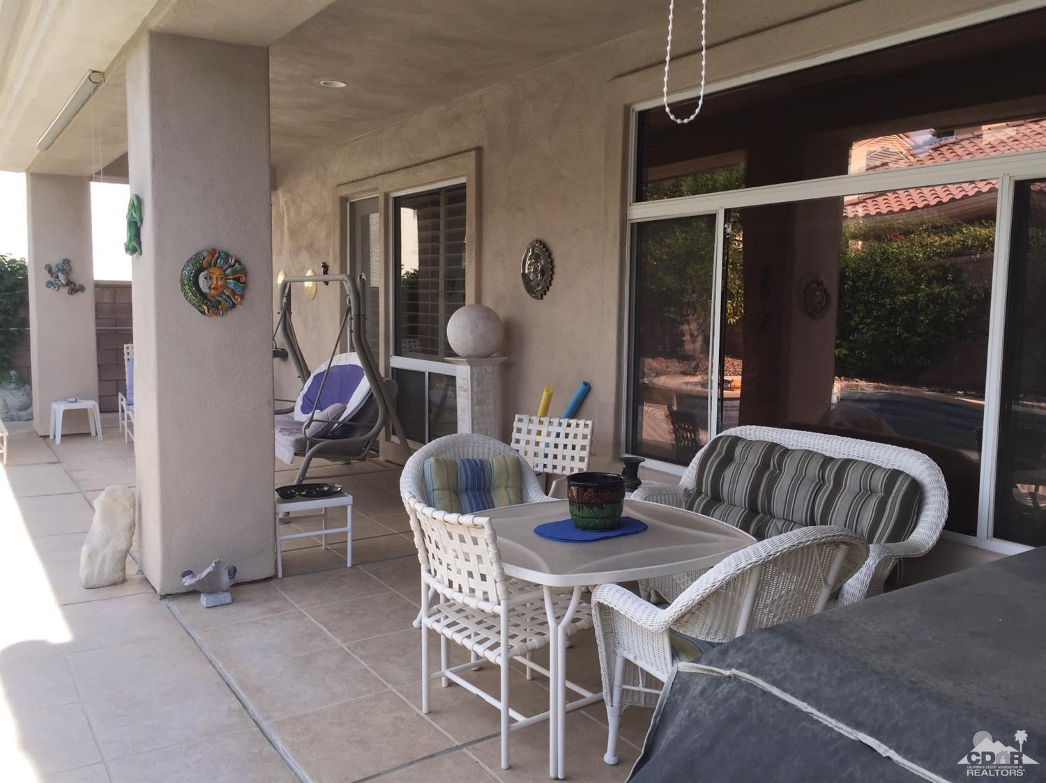 37339 Skycrest Road Palm Desert, CA 92211 - Photo 36 of 39 a dining room with furniture and window