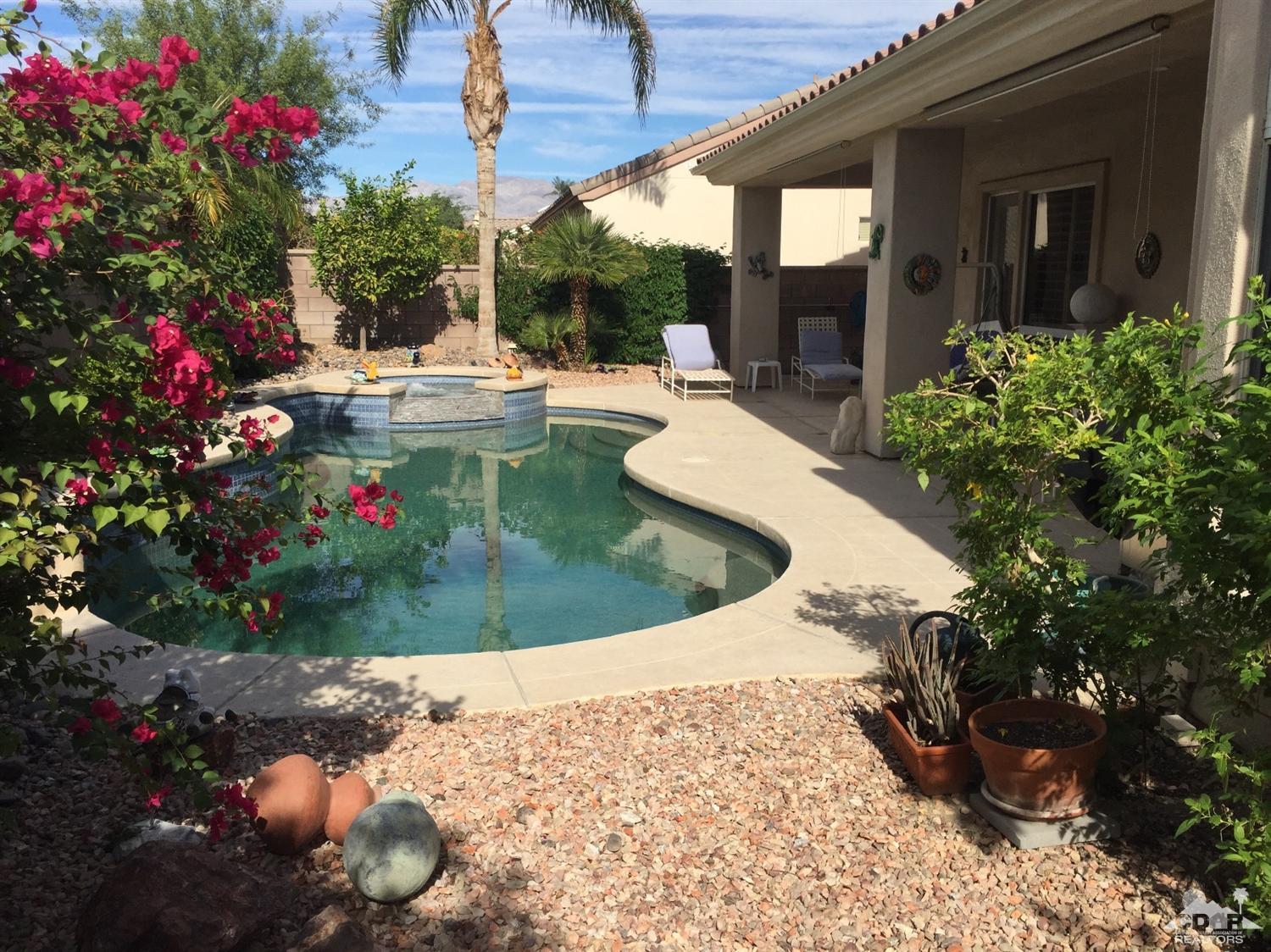 37339 Skycrest Road Palm Desert, CA 92211 - Photo 37 of 39 a view of a swimming pool with a patio