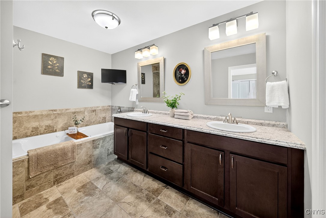 560 Shackelton Point Road Sullivan, NY 13030 - Photo 28 of 50 Master bath has dual sinks, jetted soaking tub, an